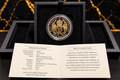 Actual 2023 Jersey Charles III Coronation £5 silver proof with selective gold-plated royal cypher, original presentation case and specifications booklet