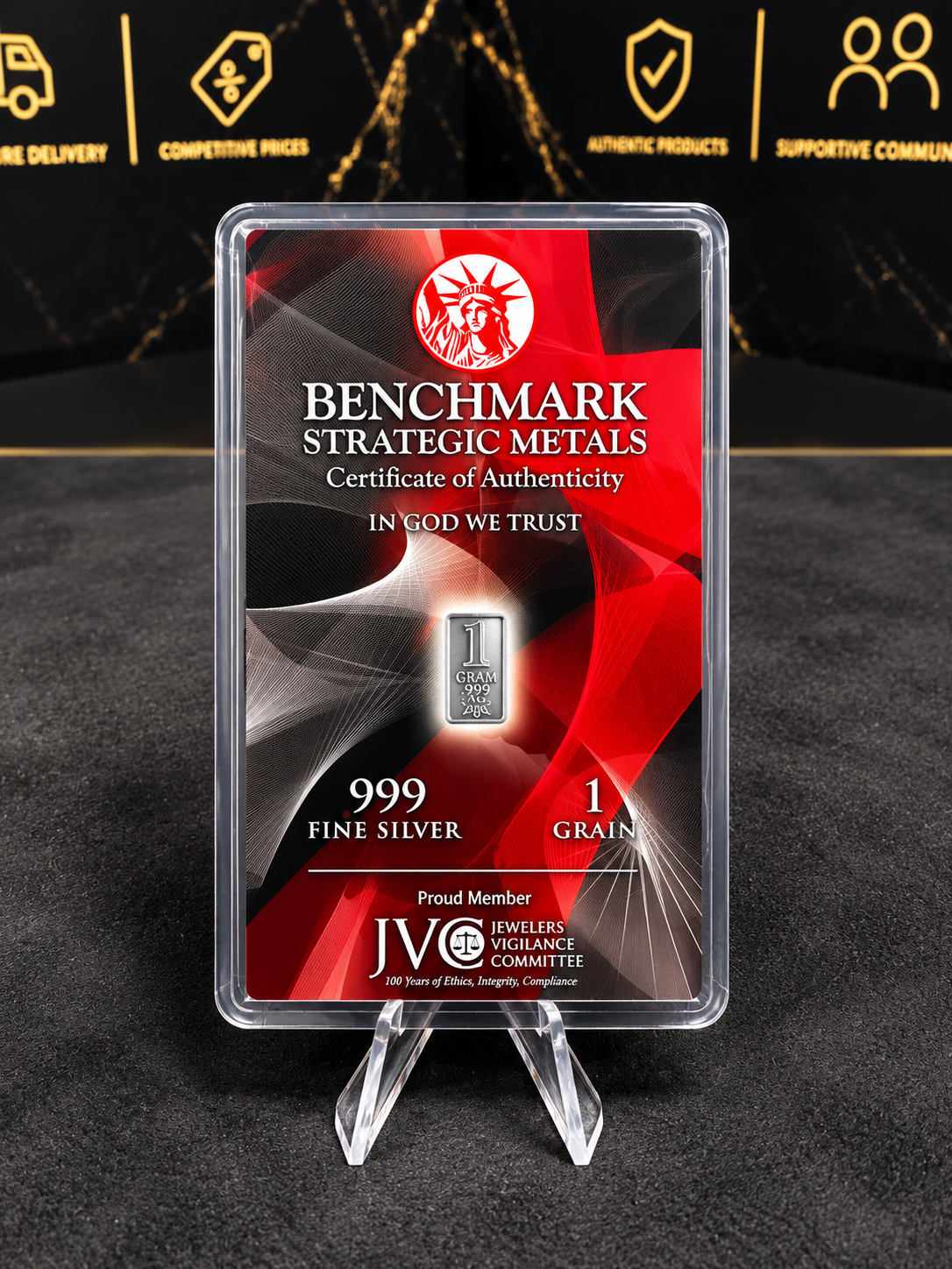 Benchmark Strategic Metals 1 GRAIN .999 Fine Silver bar Red Black Certificate of Authenticity card – photograph digitally enhanced, bar is 0.0648 grams