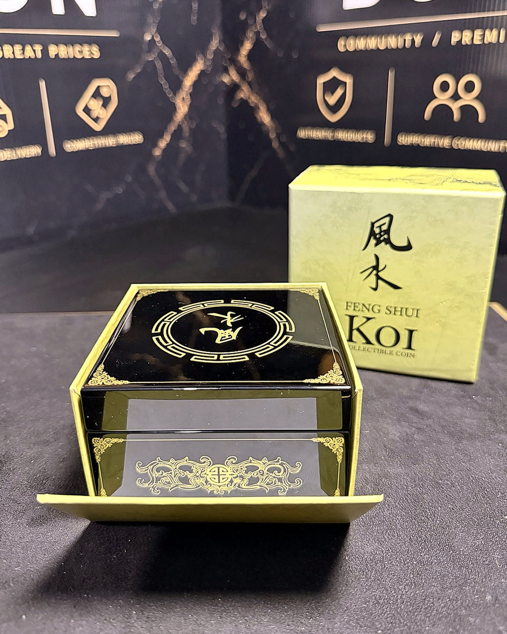 Feng Shui Koi black and gold lacquered presentation case in outer yellow packaging