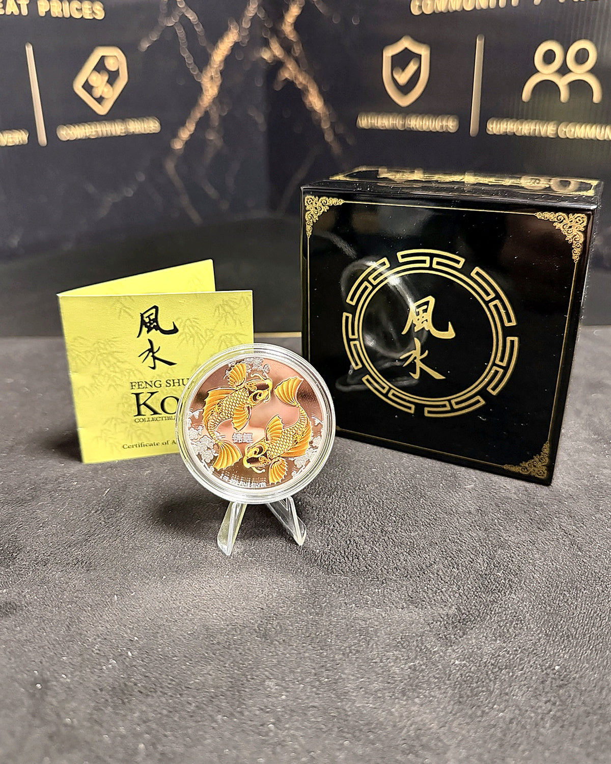 Twin Koi fish silver proof coin, certificate booklet and closed black gold lacquered box
